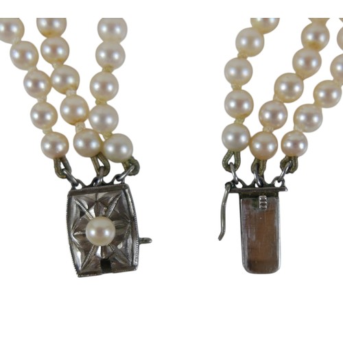 25 - A triple string of Mikimoto cultured pearls 233 pearls in total graduating from 4 to 7mm, with box a... 