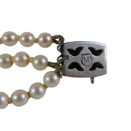25 - A triple string of Mikimoto cultured pearls 233 pearls in total graduating from 4 to 7mm, with box a... 