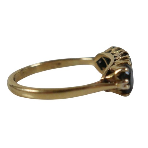 56 - An 18ct yellow gold sapphire and diamond ring set with three oval cut sapphires and four small diamo... 