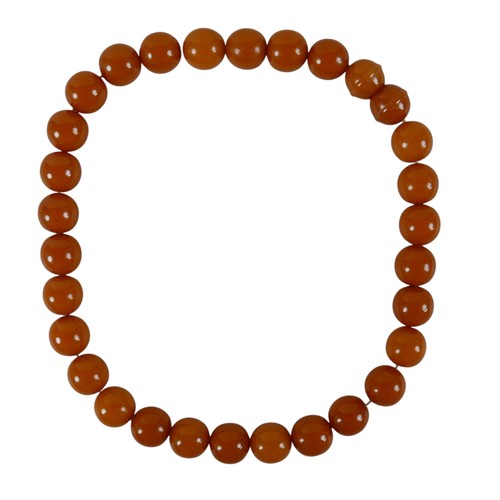 19 - A string of amber type beads 41cm long each 13mm diameter, total weight 52g.