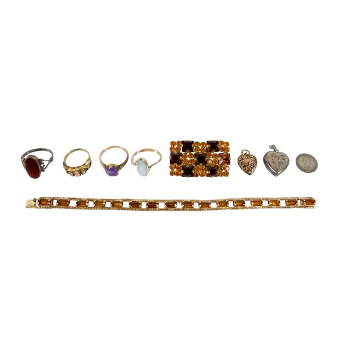 39 - A Victorian 10ct gold heart shaped pendant, 2g, plus 9ct gold ring with long oval opal (a/f), 3g, an... 