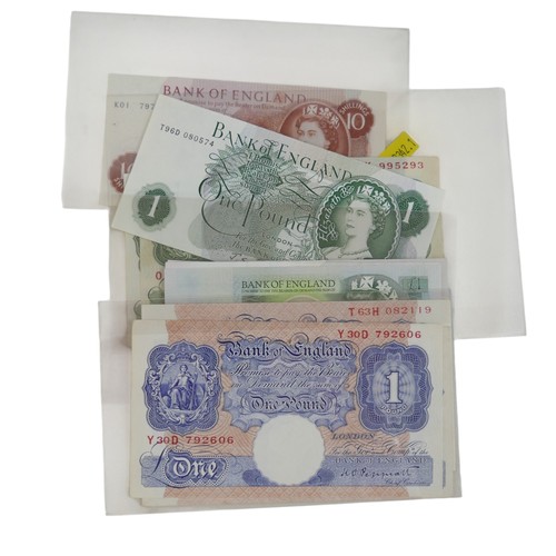 132 - A quantity of coins and banknotes to include GB: three Peppiatt 31 notes, one O'Brien 10 shilling no... 