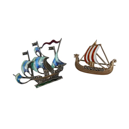 26 - Six pieces of enamel jewellery comprising a nurses buckle, single buckle, two ship brooches, a silve... 