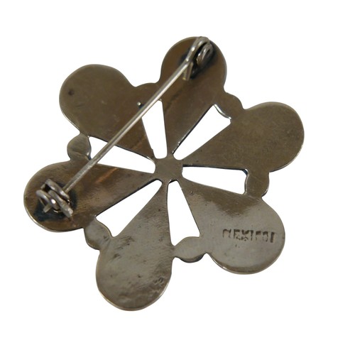 26 - Six pieces of enamel jewellery comprising a nurses buckle, single buckle, two ship brooches, a silve... 