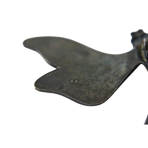 26 - Six pieces of enamel jewellery comprising a nurses buckle, single buckle, two ship brooches, a silve... 