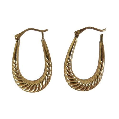 49 - Three pairs of 9ct gold earrings comprising a pair of white gold emerald studs, yellow gold hoop ear... 