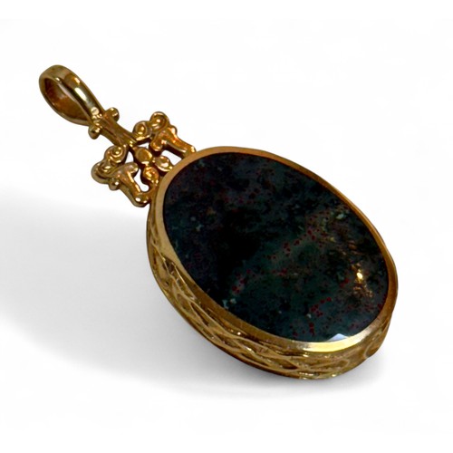 42 - A 9ct gold mother of pearl and hard stone inlaid pendant, 1.7 by 4cm, 7.9g.