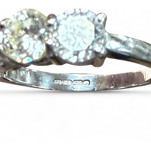 7 - An 18ct white gold five stone diamond ring, each stone approximately 5mm diameter, size Q, 5.4g.