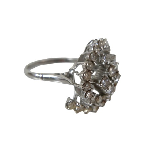 9 - A white gold and diamond set cluster ring, set centrally with four brilliant cut stones, each 3.0mm,... 