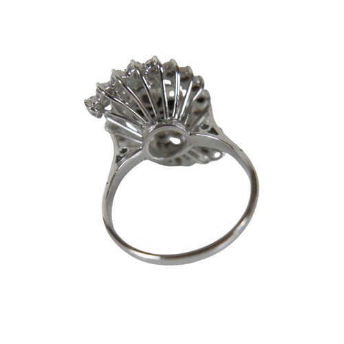 9 - A white gold and diamond set cluster ring, set centrally with four brilliant cut stones, each 3.0mm,... 