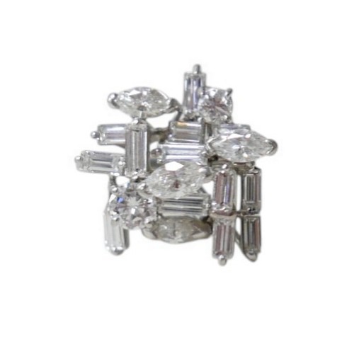 3 - A white gold and diamond set cluster ring, with a modernist asymmetric multi-level design, four marq... 