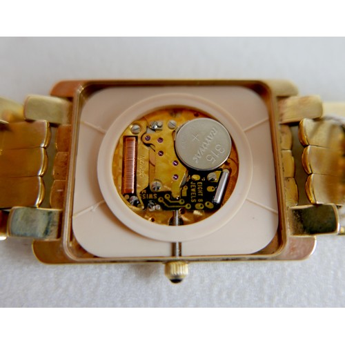 128 - A Movado 14ct yellow gold gentleman's wristwatch, model '70 C6 1451', rectangular white dial with bl... 