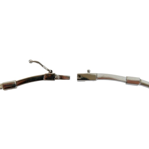 124 - A 14ct white gold and diamond semi rigid choker and matching bracelet, choker 44cm long, bracelet 17... 