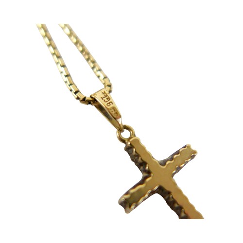 52 - A 9ct gold mounted crucifix pendant and 9ct chain, the cross set with eleven clear stones, total wei... 