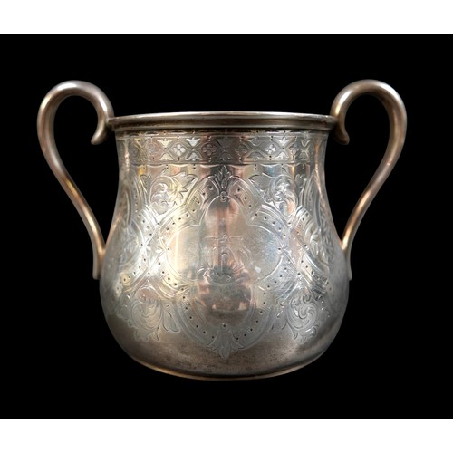 269 - A Victorian Scottish silver three piece tea service, of tapering baluster form, engraved foliate car... 