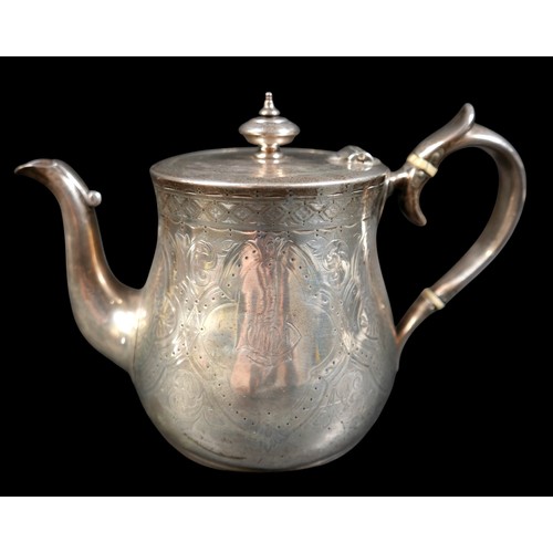 269 - A Victorian Scottish silver three piece tea service, of tapering baluster form, engraved foliate car... 