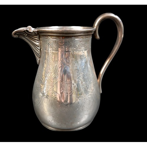 269 - A Victorian Scottish silver three piece tea service, of tapering baluster form, engraved foliate car... 