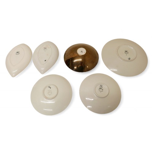 393 - A collection of five Poole Delphis plates and a bowl largest 35cm diameter.(6)