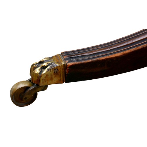 467 - A Regency style mahogany triple pedestal dining table, with cross banded decoration, raised on turne... 