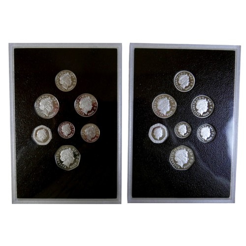 208 - An Elizabeth II platinum seven coin Emblems of Britain and seven coin Royal Shield of Arms Platinum ... 