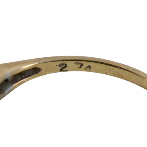 46 - Four 9ct gold rings, including a large pale blue oval cut stone ring with two small diamonds to its ... 