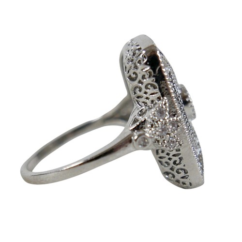 30 - A white metal Art Deco style dress ring, head size 23 by 17mm, size S, 7.6g.