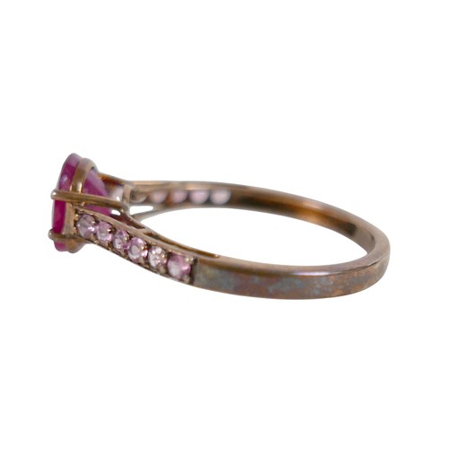25 - A 9ct yellow gold rubelitte ring the central stone 7.8mm diameter, ring size S, 2.2g.