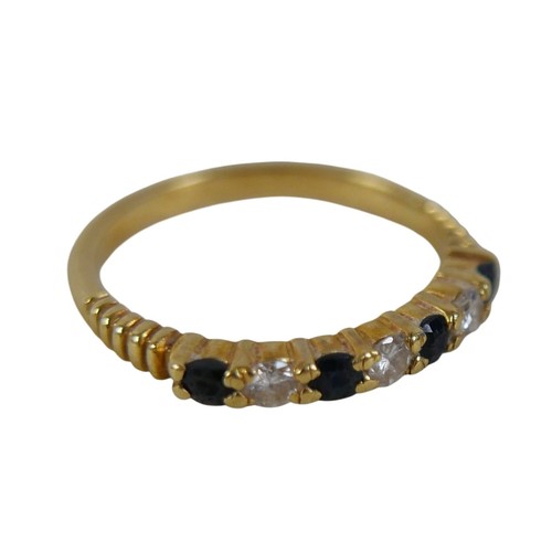 44 - An 18ct gold diamond and sapphire ring, size N, 2.8g.