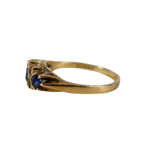 50 - A 9ct yellow gold sapphire and diamond seven stone ring, head 23 by 15mm, size P, 3.3g.