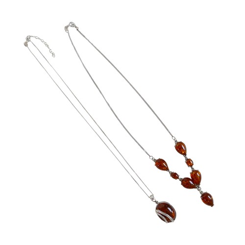18 - A silver and amber necklace and pendant and chain, pendant 3cm high.(2)