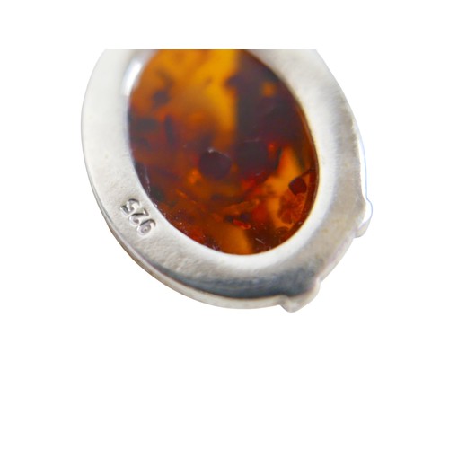 18 - A silver and amber necklace and pendant and chain, pendant 3cm high.(2)