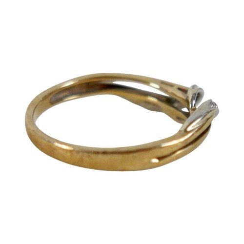 31 - An 18ct yellow and white gold crossover diamond ring size P, 2.3g.