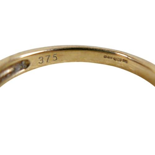 31 - An 18ct yellow and white gold crossover diamond ring size P, 2.3g.