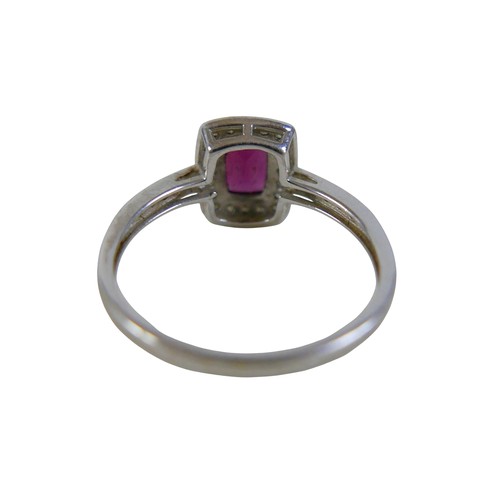 32 - A 9ct white gold ruby and diamond ring size Q, head 19 by 17mm, 2.2g.