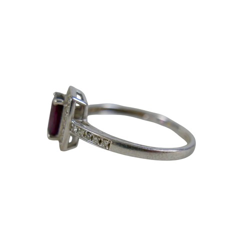 32 - A 9ct white gold ruby and diamond ring size Q, head 19 by 17mm, 2.2g.