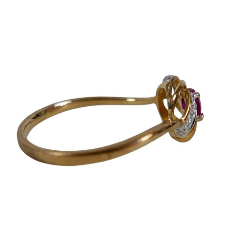 34 - A 9ct yellow gold ruby and diamond open swirl ring, head 17mm diameter, ring size Q, 1.8g.