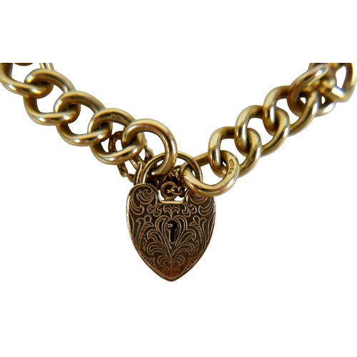 4 - A 9ct yellow gold kerb link bracelet with engraved heart shaped lock, links measure 18 by 12mm, 38.3... 
