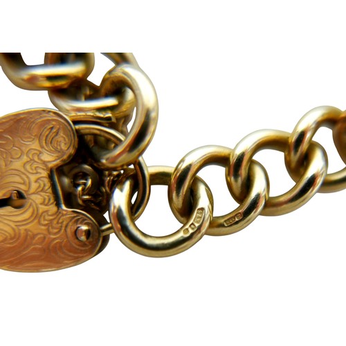 4 - A 9ct yellow gold kerb link bracelet with engraved heart shaped lock, links measure 18 by 12mm, 38.3... 
