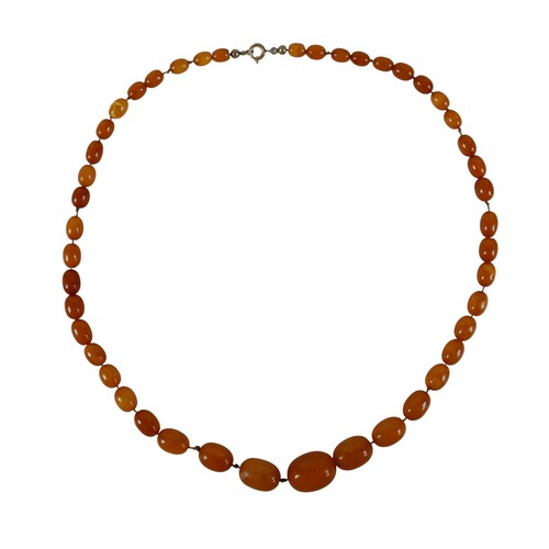 47 - Two butterscotch amber bead necklaces, both of forty five graduating beads, one with largest bead 22... 