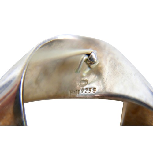 53 - A Georg Jensen silver triangular form brooch, 1.01toz.