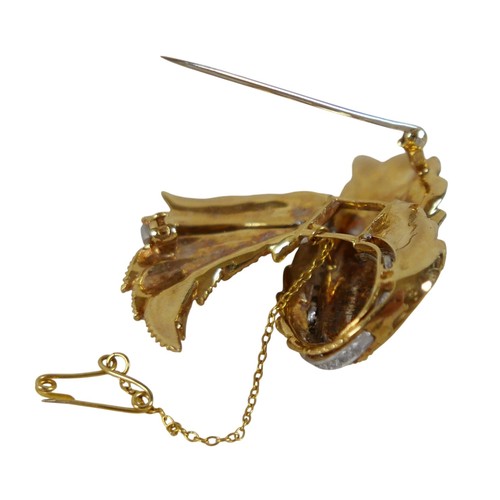 6 - An 18ct white and yellow gold diamond wing form brooch, 5cm by 4.5cm, 29.1g.