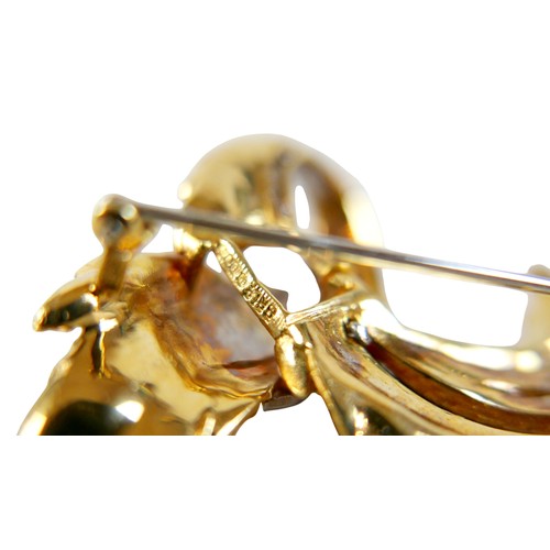 6 - An 18ct white and yellow gold diamond wing form brooch, 5cm by 4.5cm, 29.1g.