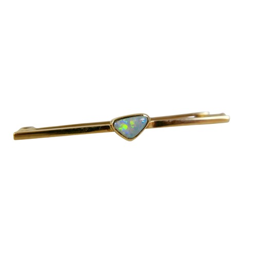 42 - A yellow metal opal bar brooch, 4.5cm wide, 2.7g.