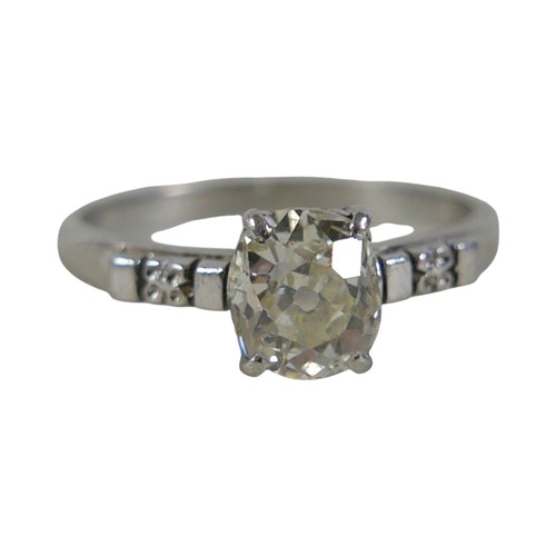 8 - A platinum (unmarked but tested) diamond solitaire ring, oval cut stone approximately 0.92cts, with ... 