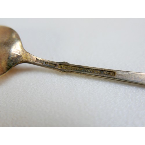 118 - A group of silver including a Lloyds silver tobacco case, inscribed 'Lloyds 7th May 1900', 2.1toz, t... 