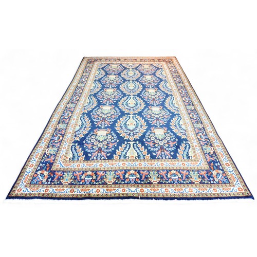 354 - A hand knotted Meshed rug, with blue ground and caucasian borders, 316 by 191cm.