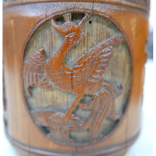 261 - A Chinese carved trinket box with tortoise shell ling and a carved wooded pot, box 17 by 14 by 13cm ... 