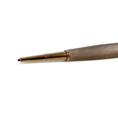 70 - A George VI 9ct gold propelling pencil, with rotating collar inscribed in dark blue and red 1 to 31 ... 