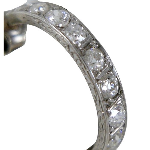 47A - A pair of diamond half hoop platinum earrings, made from a full eternity ring, each round cut stone ... 