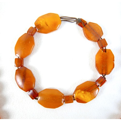 47 - Two butterscotch amber bead necklaces, both of forty five graduating beads, one with largest bead 22... 